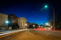 Traffic moving past the National Gallery of Art at night in Wash Royalty Free Stock Photo
