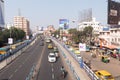 Traffic and pedestrians on crowded city streets in evening rush hour on Dhakuria bridge flyover one of the busiest area in Royalty Free Stock Photo