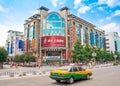 Traffic and pedestrians in Guilin Boulevard. Commercial and business street scene. Guilin. China