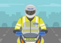 Traffic police officer riding motorcycle on the highway. Close-up view of motorcycle rider or biker wearing safety vest.