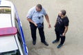 traffic police officer talking to a violator of the law. text in Russian: Traffic police Royalty Free Stock Photo