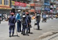 Traffic policeman, talking with the other policemans, in time of protests in Kathmandu