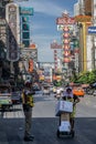 Traffic policeman and woman working in China Town Bangkok Thailand