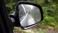 Traffic in Rain, Driving Car in Raining, Rainy Drops View on Mirror Window Glass, Storm on Road Highway, Bad Weather Journey Trip Royalty Free Stock Photo