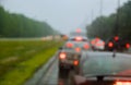 Traffic in rainy day with road car window with rain drops Royalty Free Stock Photo