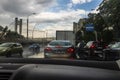Traffic in rainy day with road view through car window with rain drops, blurry traffic on rainy day. Bucharest, Romania, 2020 Royalty Free Stock Photo