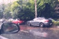 Traffic in rainy day with road view through car window with rain drops, blurry traffic on rainy day. Bucharest, Romania, 2020 Royalty Free Stock Photo