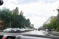 Traffic in rainy day with road view through car window with rain drops, blurry traffic on rainy day. Bucharest, Romania, 2020 Royalty Free Stock Photo