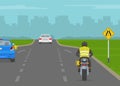 American single-transition traffic sign. Back view of a car and motorcycle rider merging on highway. Royalty Free Stock Photo