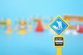 Traffic road barrier: A warning barrier for road closure and website under construction page. Includes warning and stop signs, Royalty Free Stock Photo