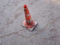 Traffic road-cone on the asphalt, damaged Traffic cone orbiting