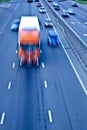 Traffic road with orange truck