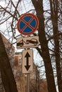 Traffic road sign Parking prohibited with Direction of sign. Evacuation on tow truck Royalty Free Stock Photo