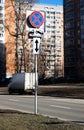 Traffic road sign Parking prohibited with Direction of sign. Evacuation on tow truck Royalty Free Stock Photo