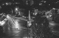 Traffic on roundabout street in city of Vranje at night