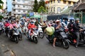 Motorbike riders at rush hour in the streets of Ho Chi Minh City, formerly Saigon, Vietnam Royalty Free Stock Photo