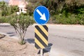 Traffic safety signs on city street road. direction movement sign outdoor. danger warning symbol on urban way for transport automo