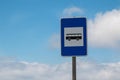 Traffic sign Bus stop and a cloudy sky Royalty Free Stock Photo