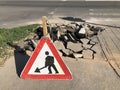 Traffic sign construction zone by the road in street scene Royalty Free Stock Photo