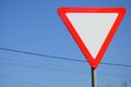 Traffic sign in the form of a white triangle. Give way