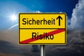 Traffic sign with the german words for Safety and risko - Sicherheit und Risiko
