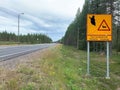 A traffic sign warning about the risk of accident with a reindeer