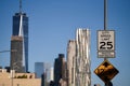 Traffic sign indicating the speed limit as 25mph at the entrance to Manhattan.