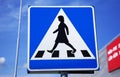 Traffic sign for pedestrian crossing with female figure