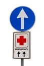 Traffic sign with red cross to indicate direction for emergency
