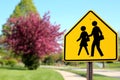 Traffic sign.  School zone  yellow warning board Royalty Free Stock Photo