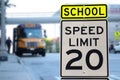 Traffic sign.  School zone  yellow warning board. Speed limit 20 Royalty Free Stock Photo