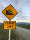 Traffic Sign: Steep descent sign on yellow background. The road descends. Warning signs let you know road changes are coming up on