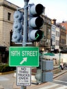 Traffic signal lights and street signs