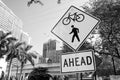 Traffic signs on city road in miami, usa. Bicycle and pedestrian crossing ahead warning. Transportation traffic and Royalty Free Stock Photo