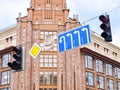 Traffic signs indicating the direction of movement and traffic light Royalty Free Stock Photo