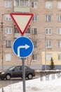 Traffic signs mean give way and turn right only. Royalty Free Stock Photo