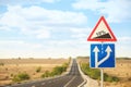 Traffic signs near empty asphalt highway. Road trip Royalty Free Stock Photo