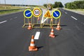 Traffic signs during repair and pain Royalty Free Stock Photo
