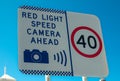 Traffic signs warning for speed limits 40 km/h and Red light speed camera ahead. Royalty Free Stock Photo