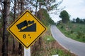 Traffic signs warning up to hill steep road sign to slope a steep climb 8 percent gradient in the road ahead at green grass in the Royalty Free Stock Photo