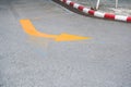 Traffic Signs ,yellow arrow Turning right road sign on the road floor Royalty Free Stock Photo