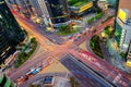 Traffic speeds through an intersection in Gangnam. Royalty Free Stock Photo