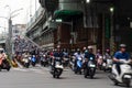 traffic street view to the road bridge from highway full with many motorcycle vehicle heavy traffic inbound to the city