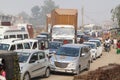 Traffic on the streets of a big mess. Taxis, mopeds and pedestrians cross without any order. Royalty Free Stock Photo