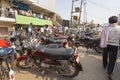 Traffic on the streets of a big mess. Taxis, mopeds and pedestrians cross without any order. Royalty Free Stock Photo