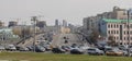 Traffic on the streets of Moscow. Cars, bridge, buildings with the inscription Memorial.