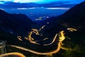 Traffic trails on Transfagarasan pass at night. Crossing Carpathian mountains in Romania, Transfagarasan is one of the most