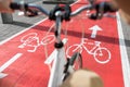 close up of bicycle's wheel on bike lane in city Royalty Free Stock Photo