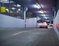 Traffic in underground parking garage Royalty Free Stock Photo