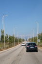 Traffic violation by the Albanian drivers - a car makes overtaking after the road sign overtaking prohibited